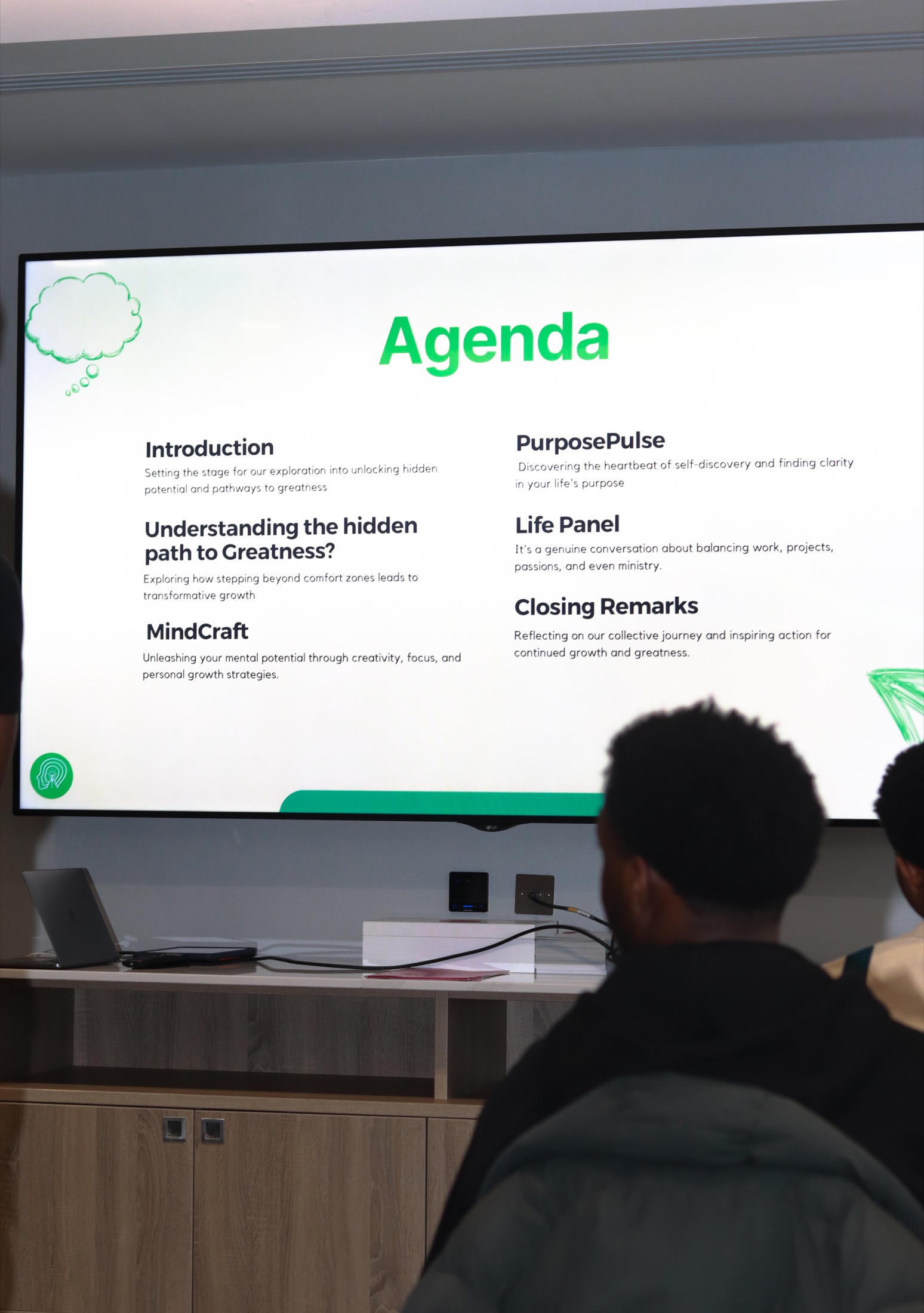 The Hidden Path to Greatness event agenda on screen