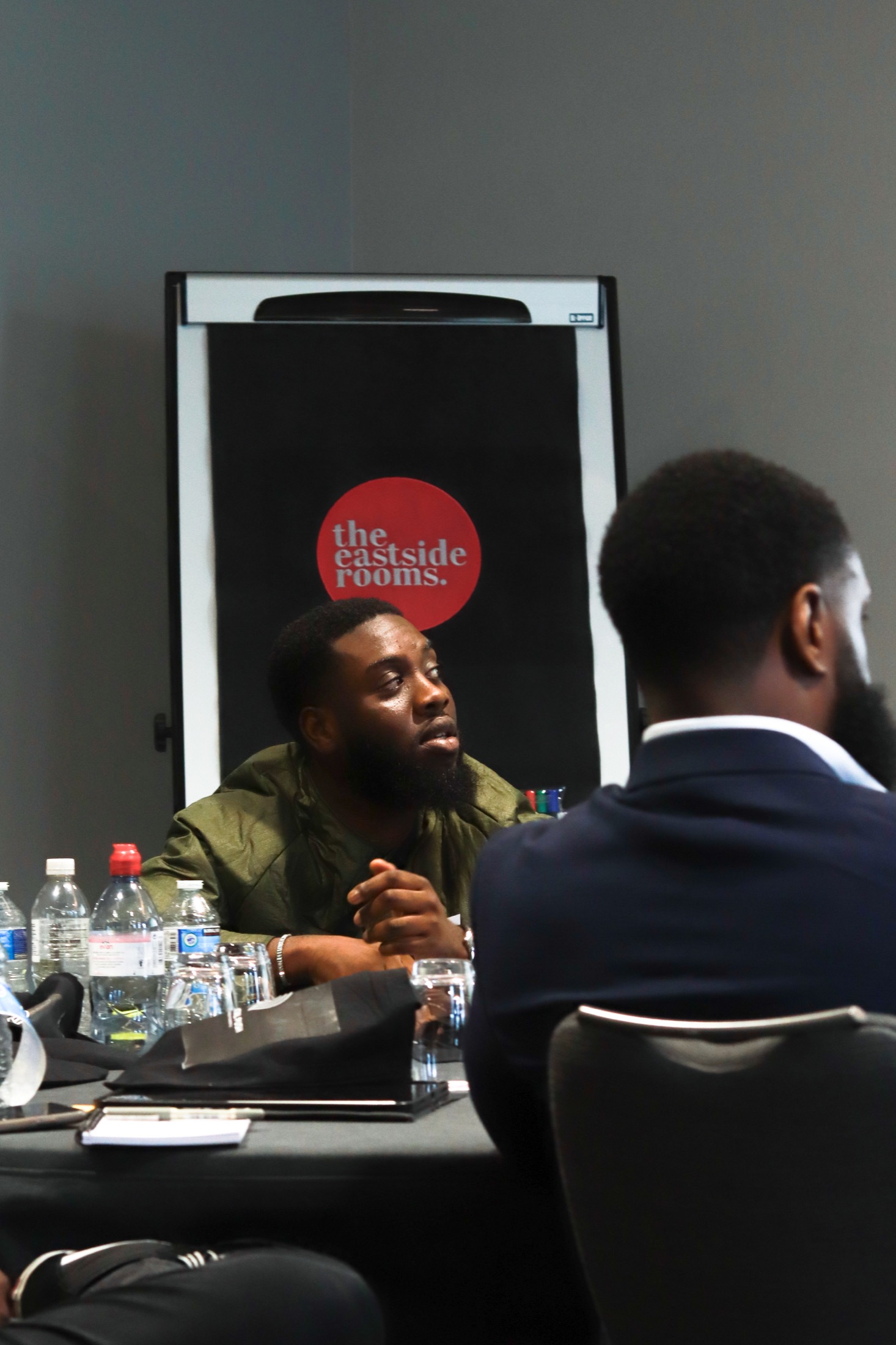 People in conversation at The Hidden Path to Greatness event